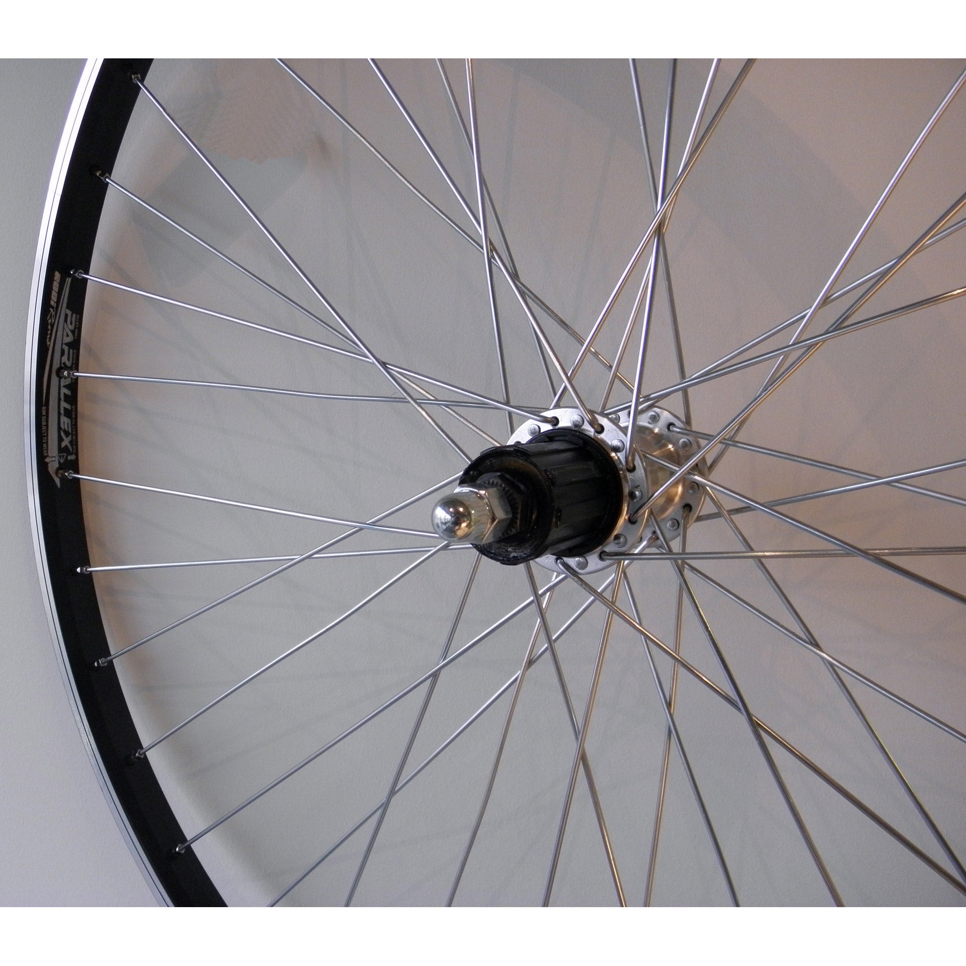 Achterwiel 28-15/8-13/8 622 cass 8V/9V vast alu Paralex Zw