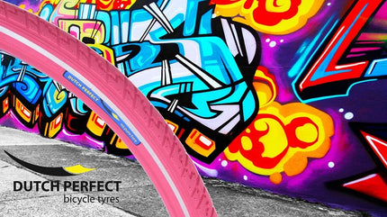 Pneu Dutch Perfect 28 x 1 ½" / 40-635 anti-crevaison - rose avec bande réfléchissante